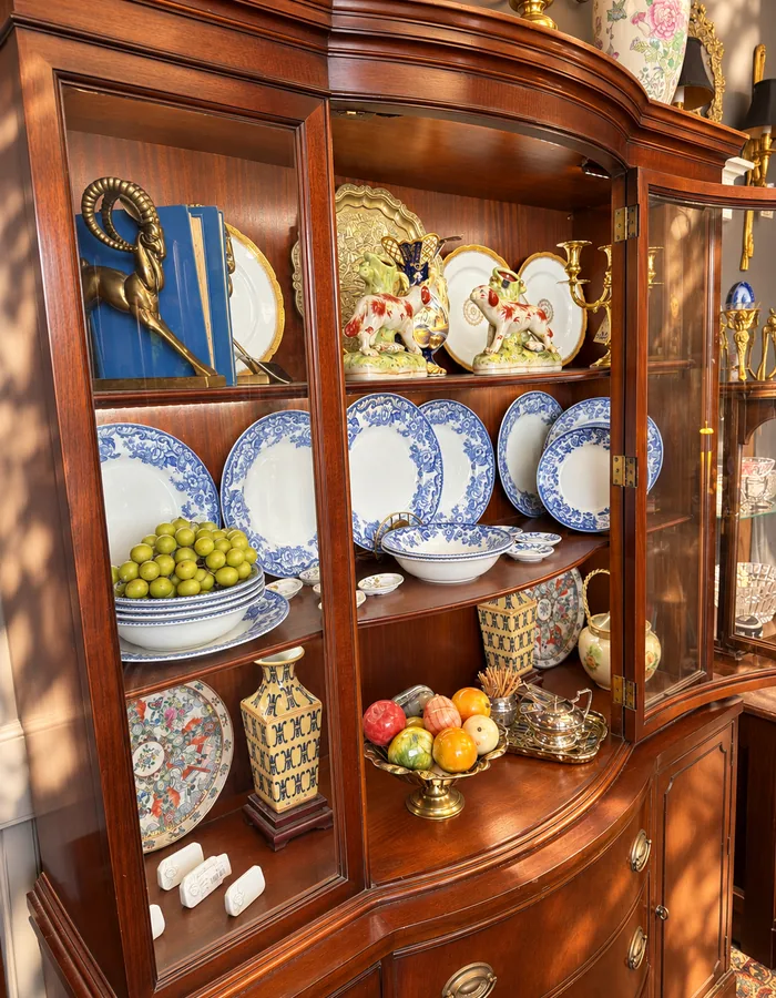A mahogany china cabinet with Spode and Staffordshire
